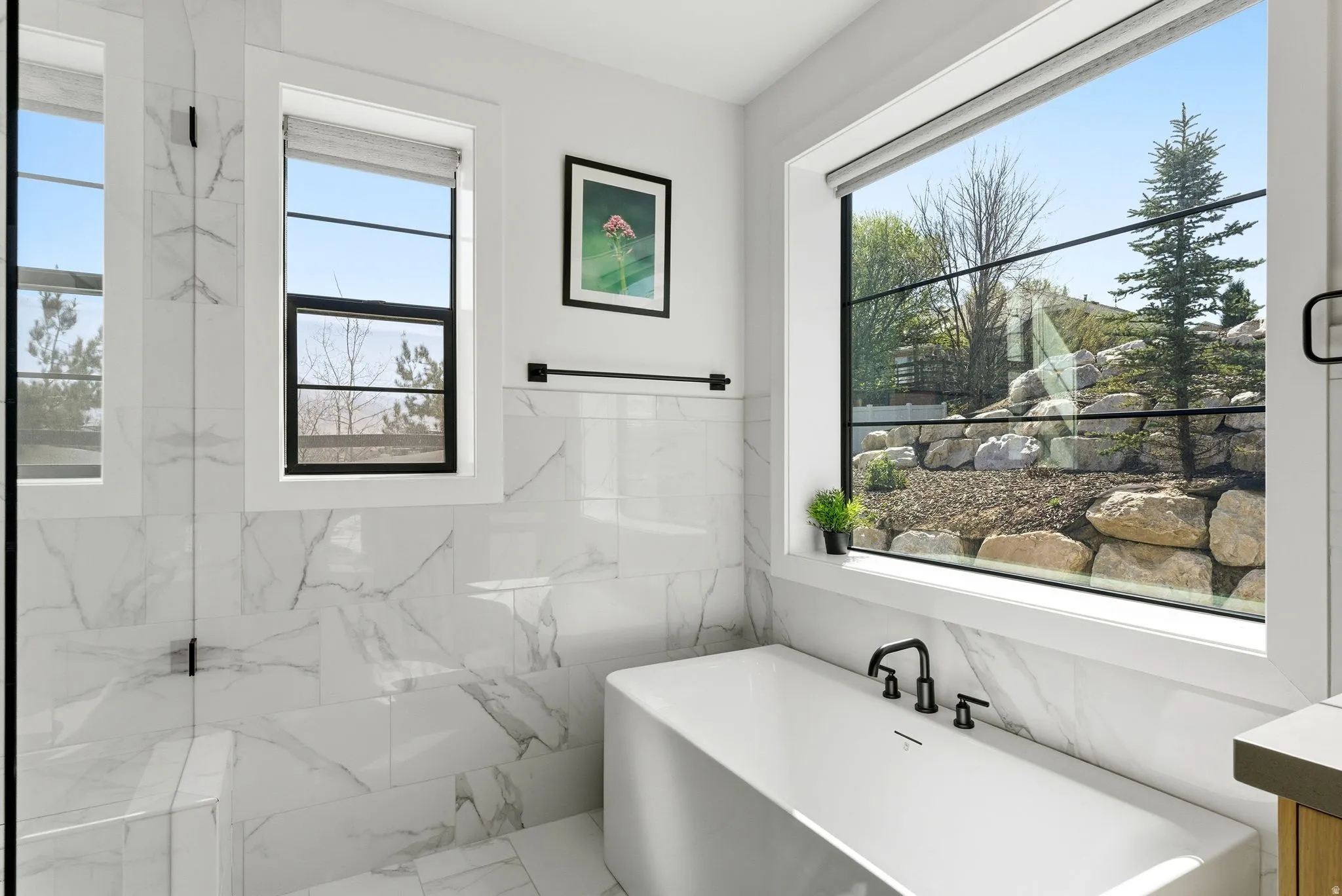 Primary Bathroom featuring a freestanding bath