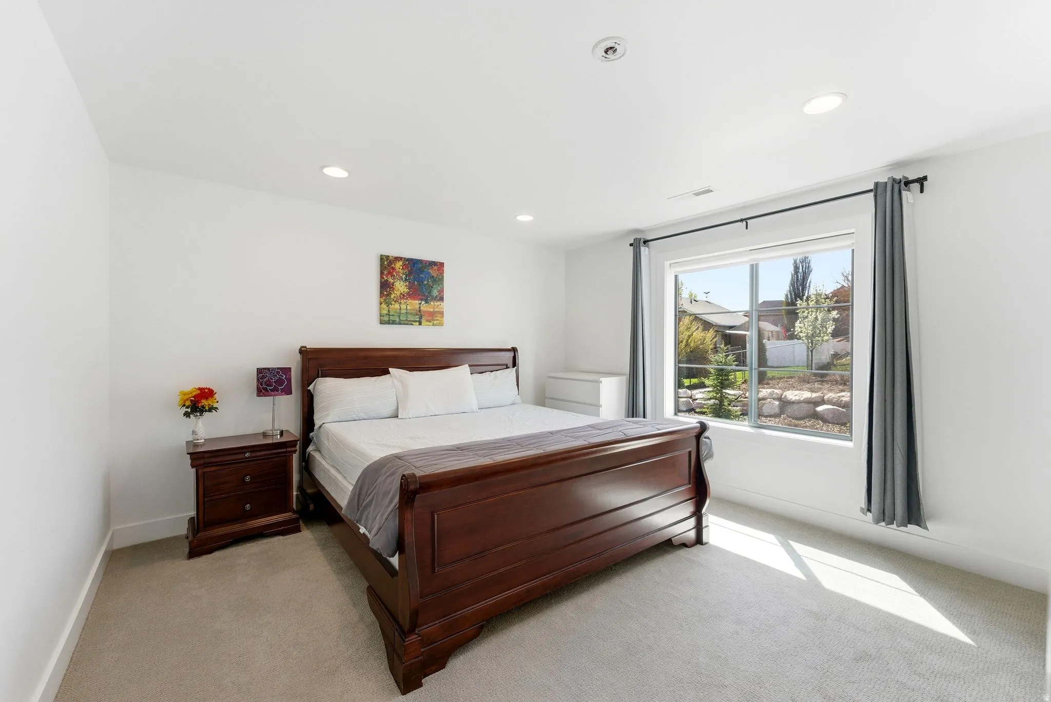 Bedroom featuring recessed lighting and light carpet