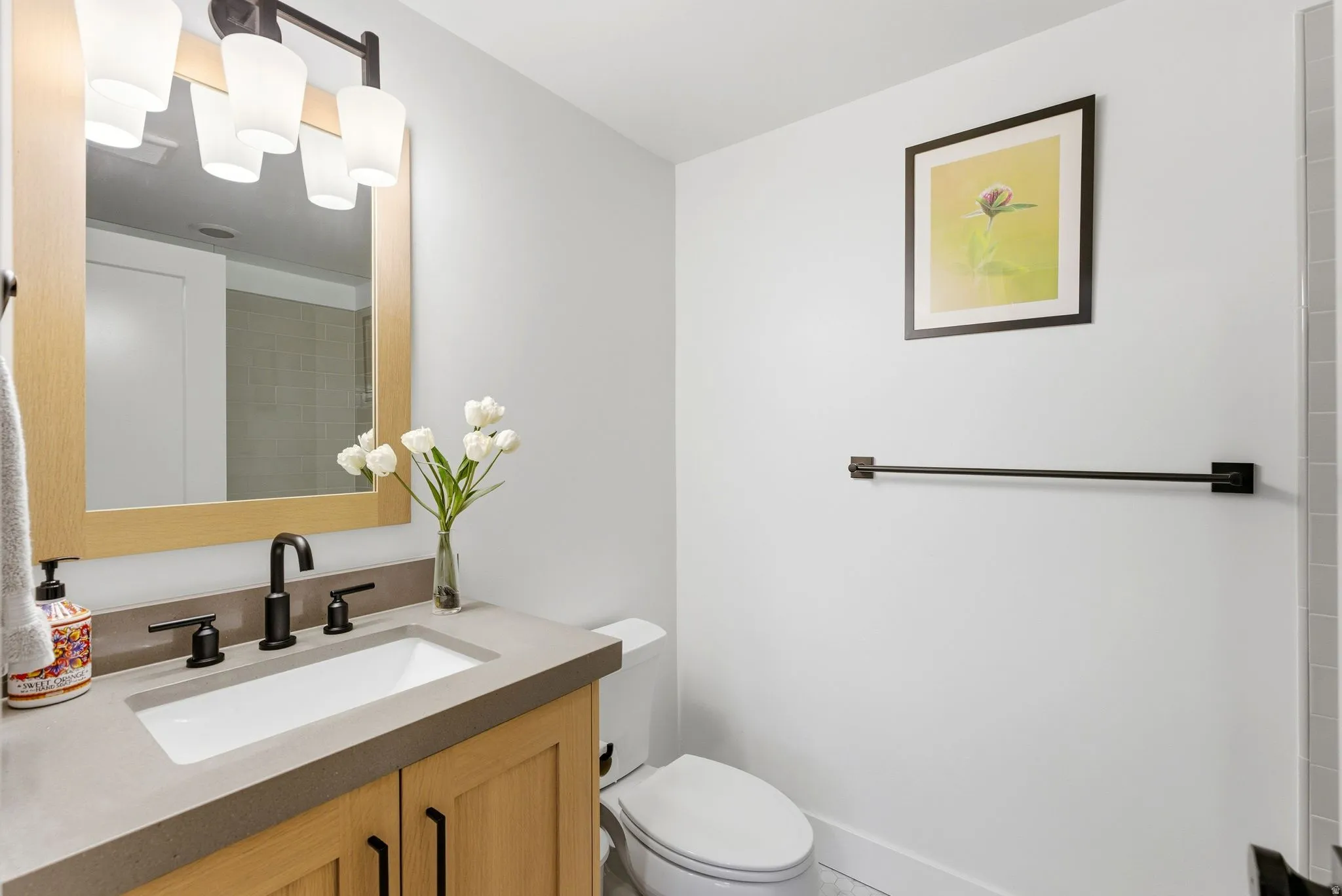 Bathroom with vanity and toilet