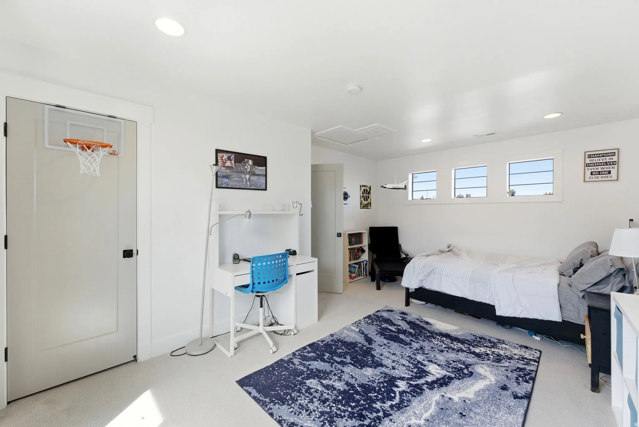 Bedroom featuring recessed lighting, a desk, and light carpet