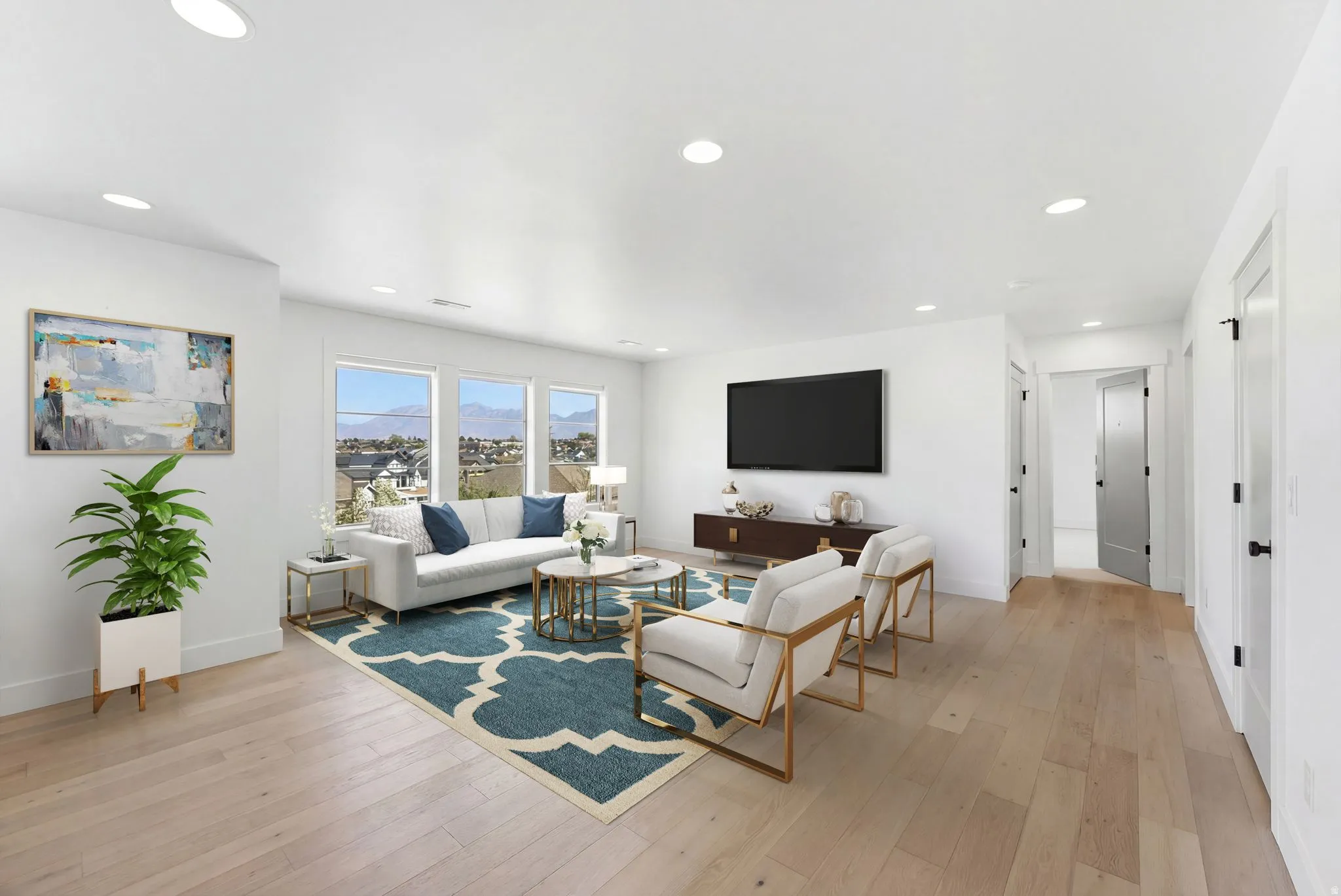 Virtually Staged Living room featuring light wood finished floors and recessed lighting