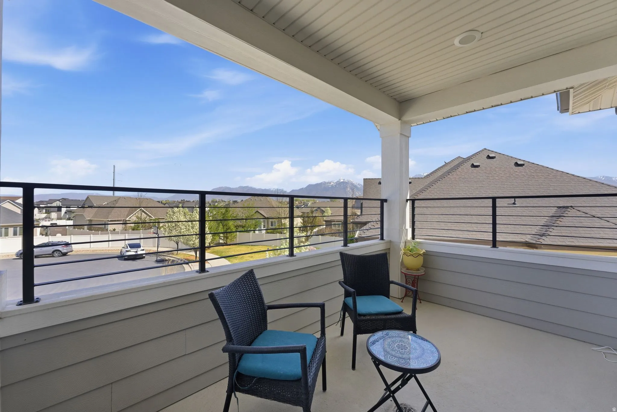 Balcony featuring a mountain view and a residential view