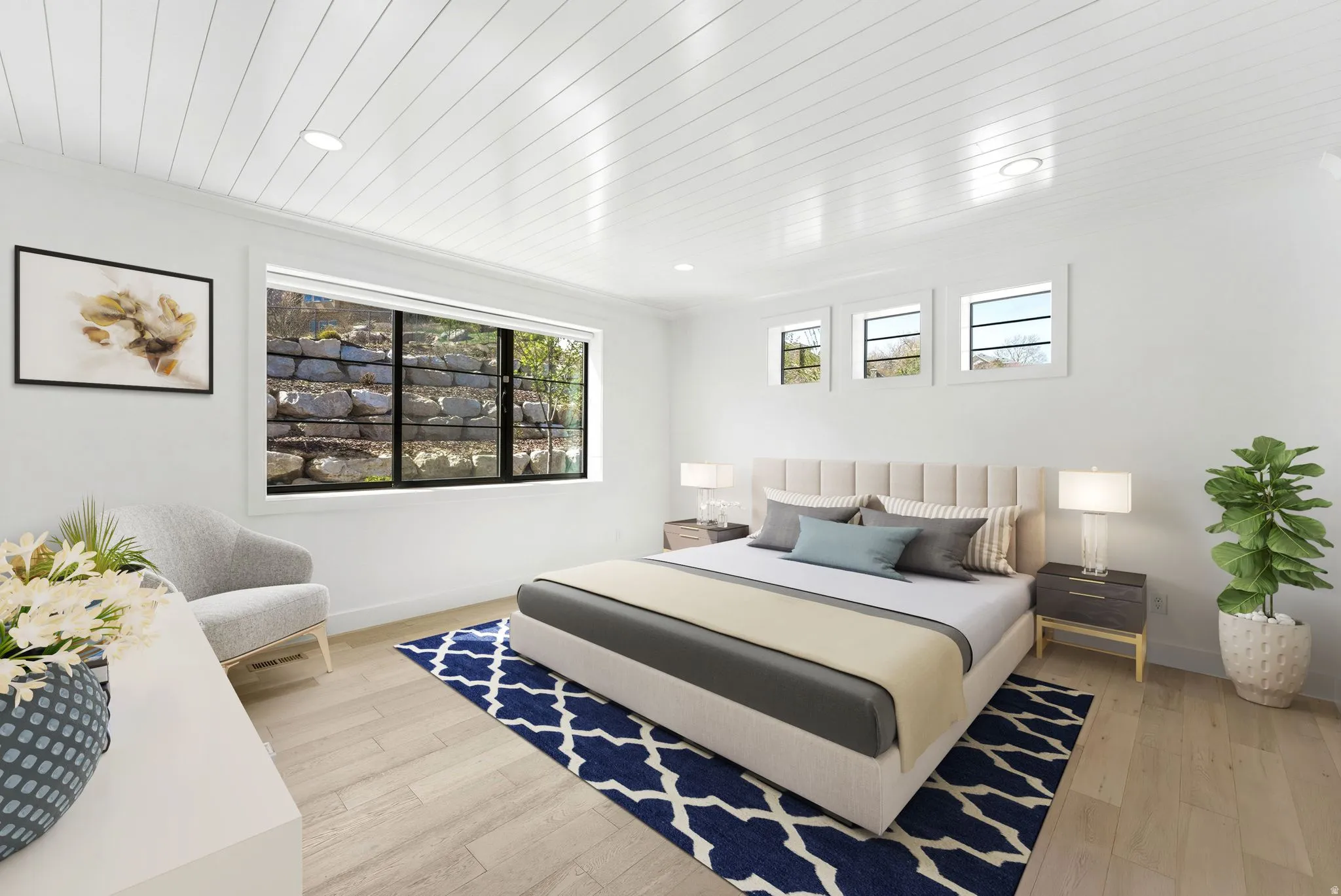 Virtually staged primary Bedroom with light wood-style flooring, wood ceiling, and recessed lighting