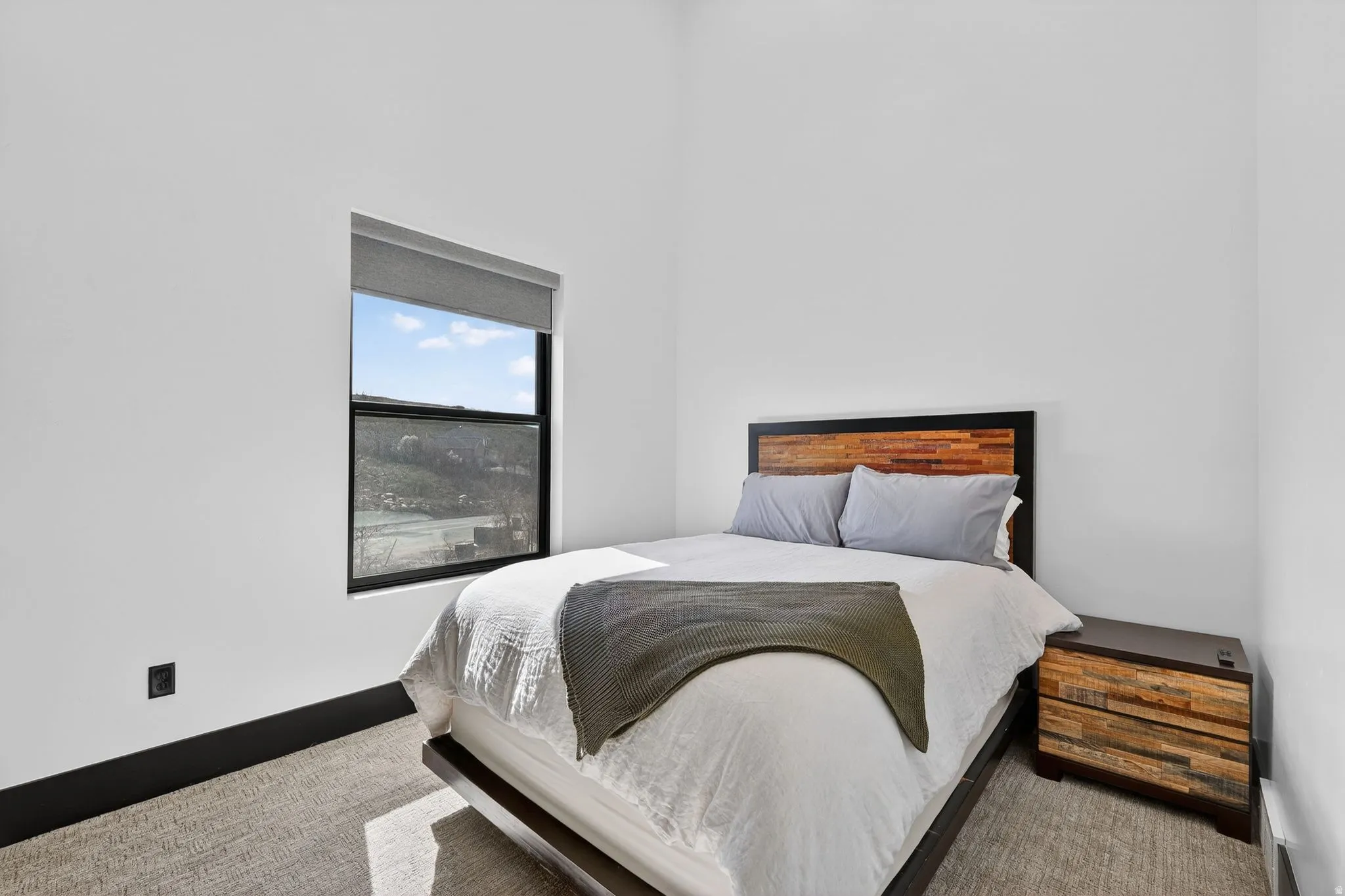 Bedroom with carpet flooring