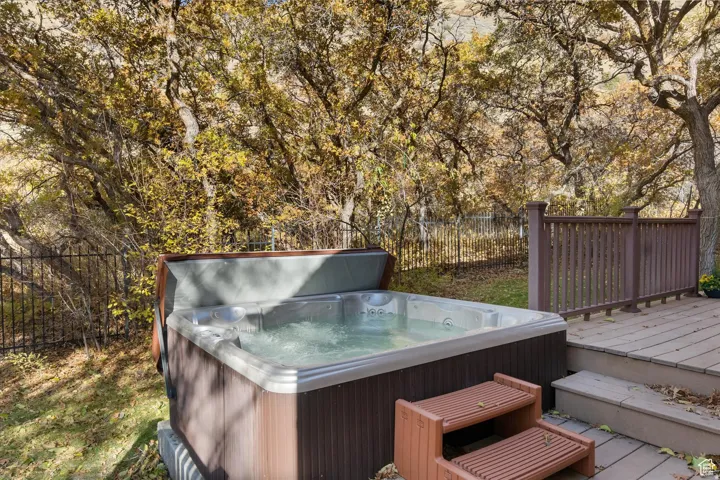 Deck featuring a hot tub