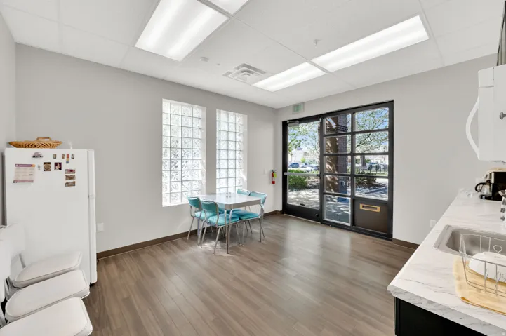 Dining room featuring a paneled ceiling and wood finished floors