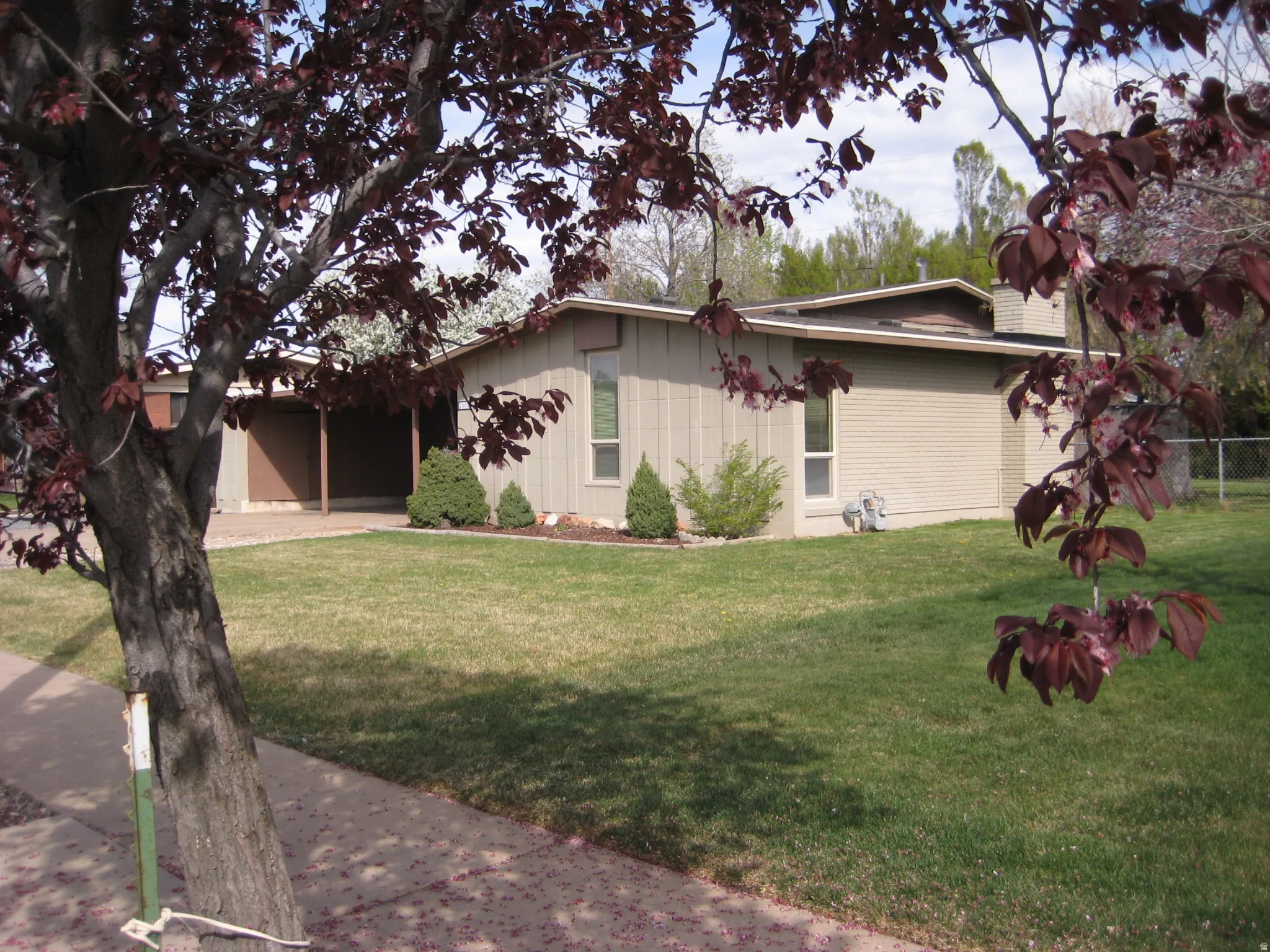 View of side of property with board and batten siding