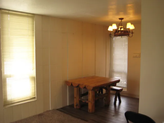 Dining room featuring a chandelier and wood finished floors