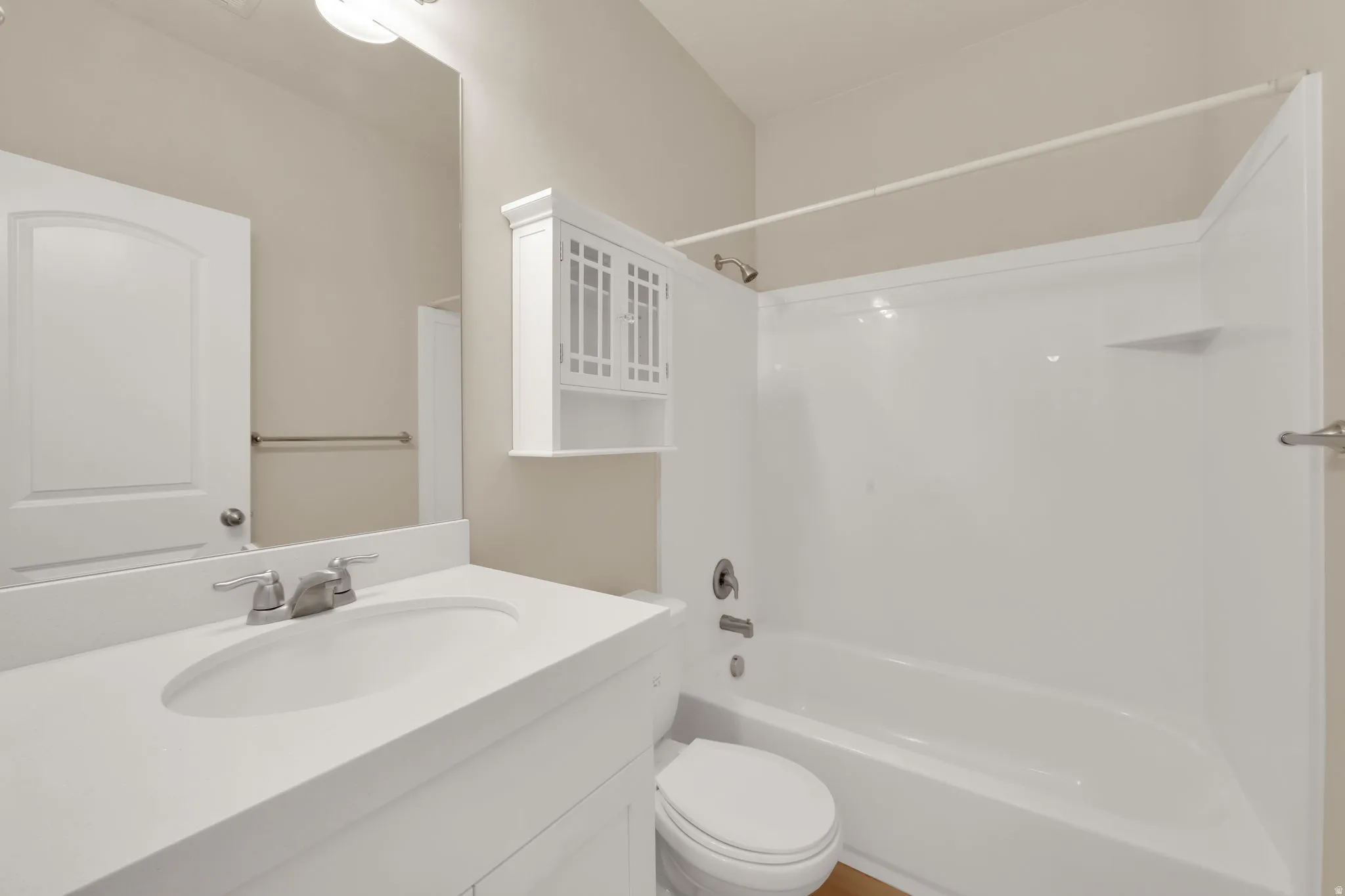 Full bath featuring vanity and tub / shower combination