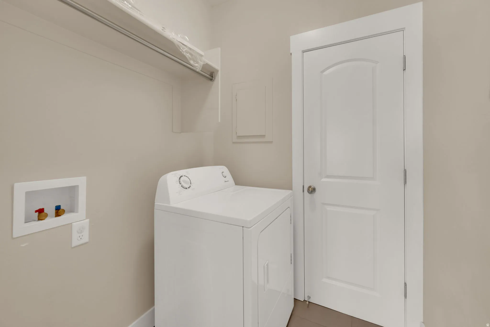 Laundry room featuring washer / dryer