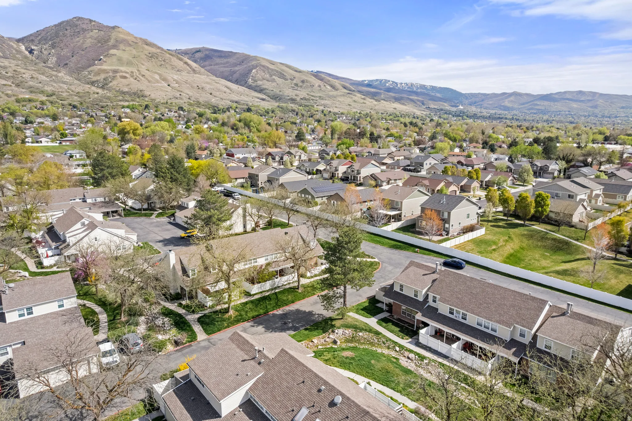 Aerial perspective of suburban area with mountains