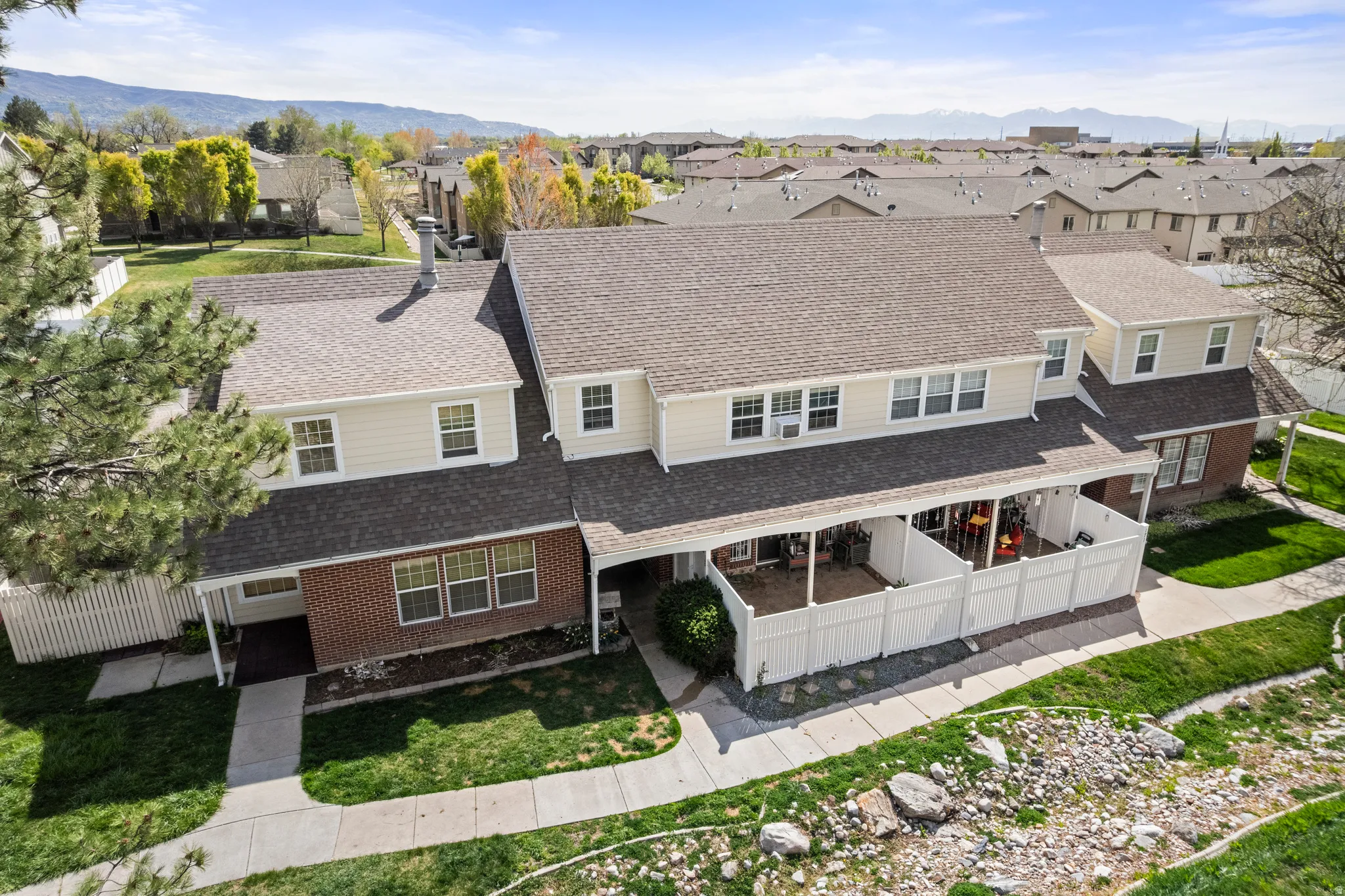 Aerial view of residential area with a mountainous background