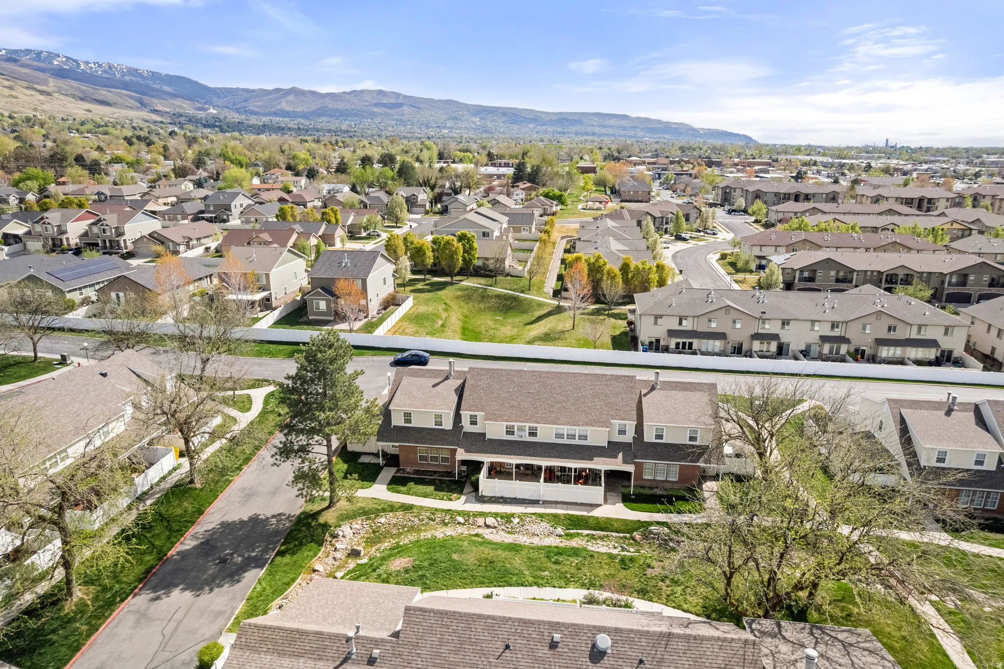Aerial perspective of suburban area featuring mountains