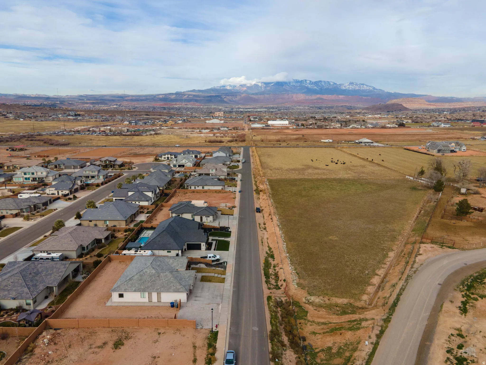Aerial view of residential area with mountains