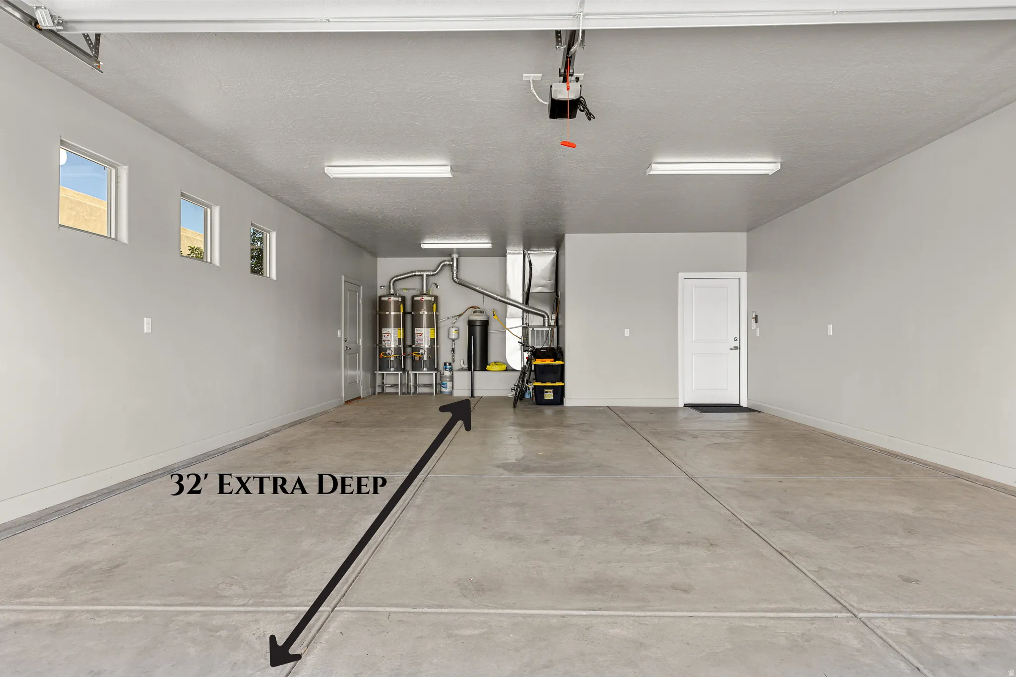 Garage can Fit Large Trucks and Toys! 2 Water Heaters & Water Softener Included