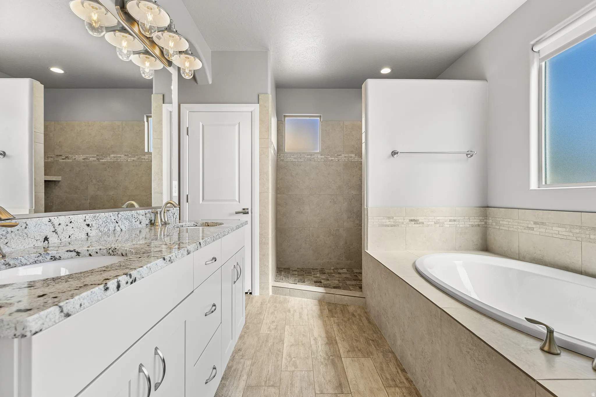 Primary Bathroom with Walk in Shower Shower, Tub & Dual Sinks