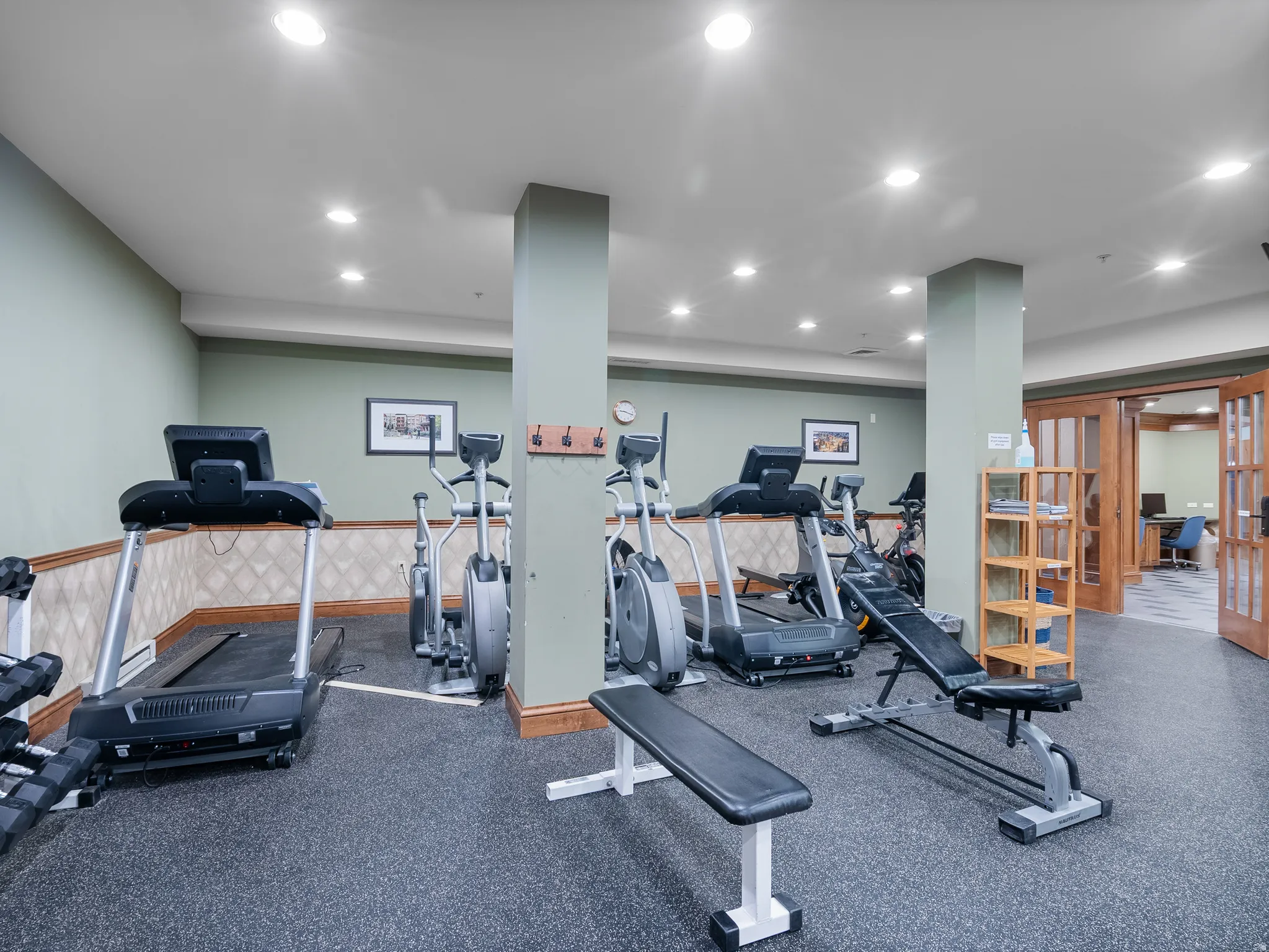 Workout area featuring recessed lighting