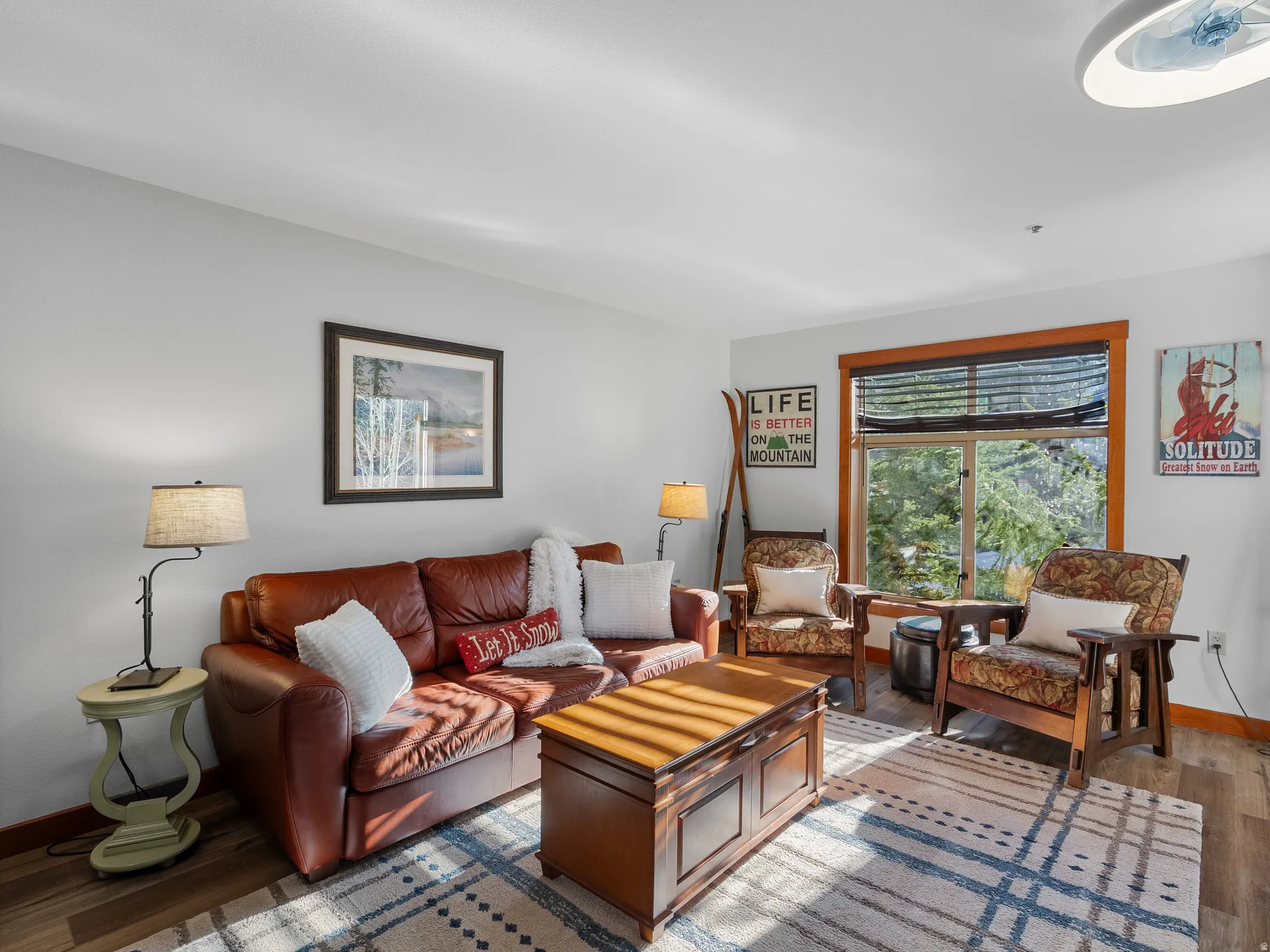 Living area with wood finished floors.