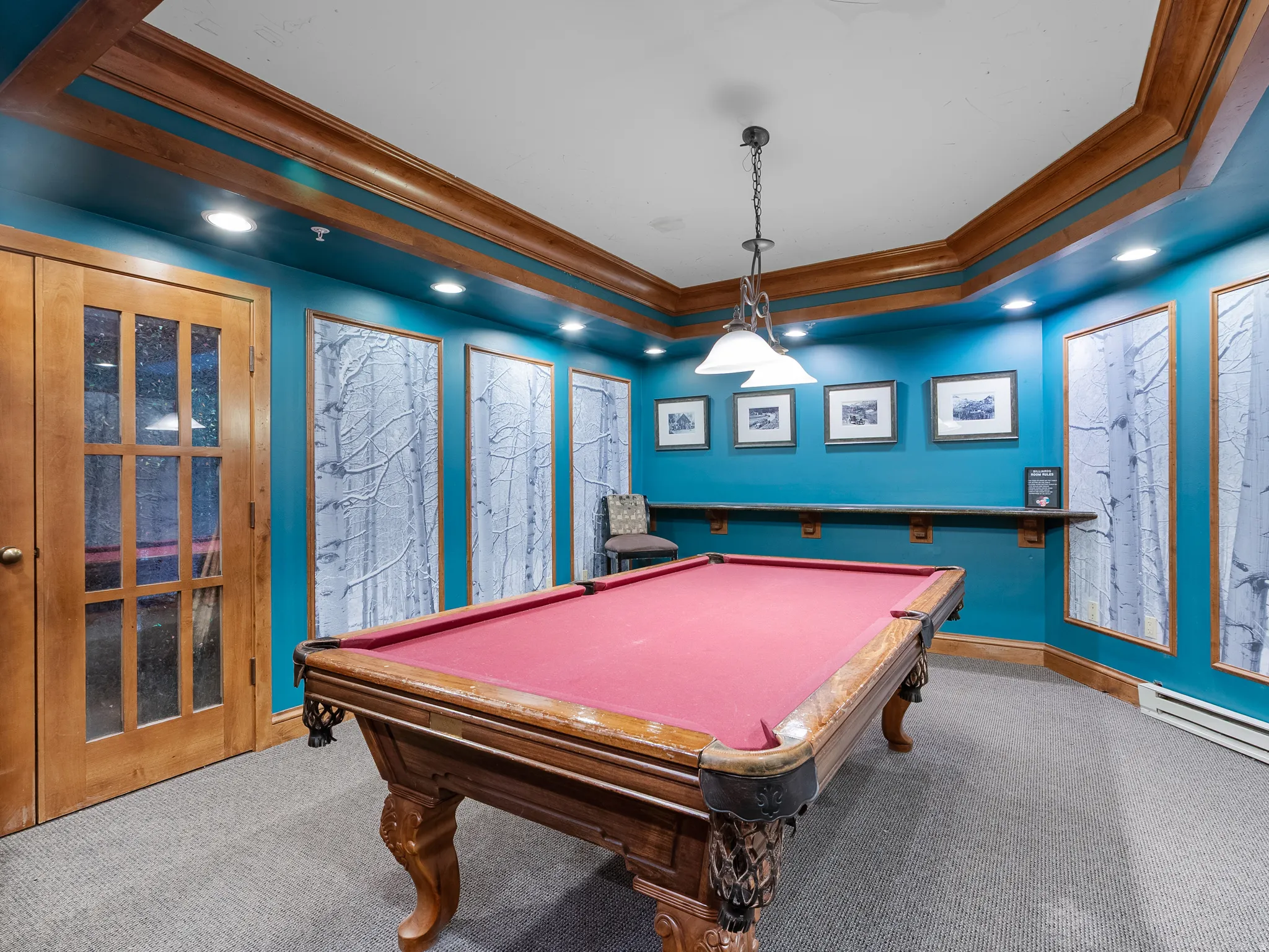 Rec room featuring ornamental molding, billiards, a tray ceiling, and carpet
