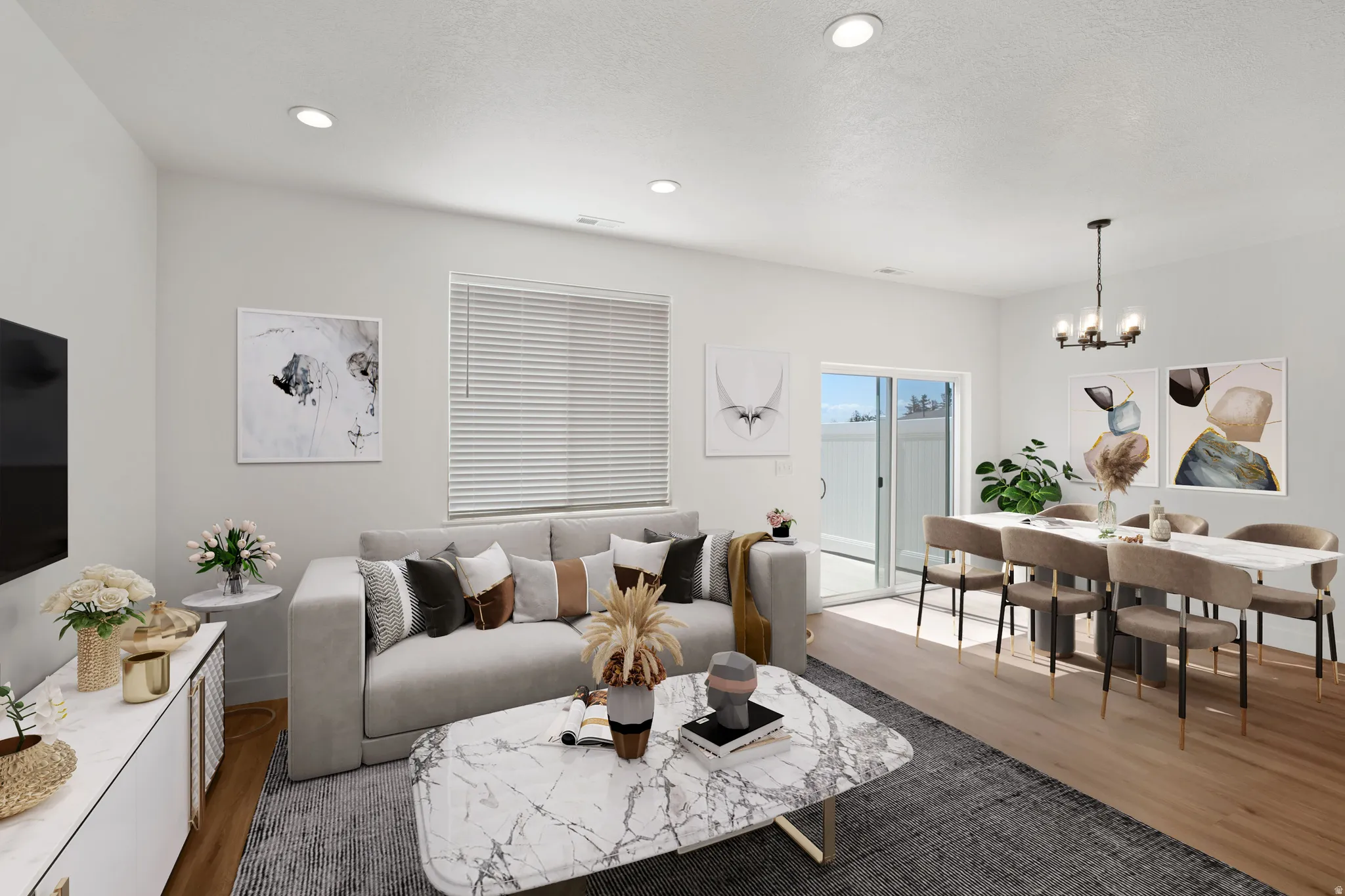 Living room featuring wood finished floors and hanging lights