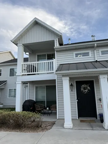 View of front facade with a balcony
