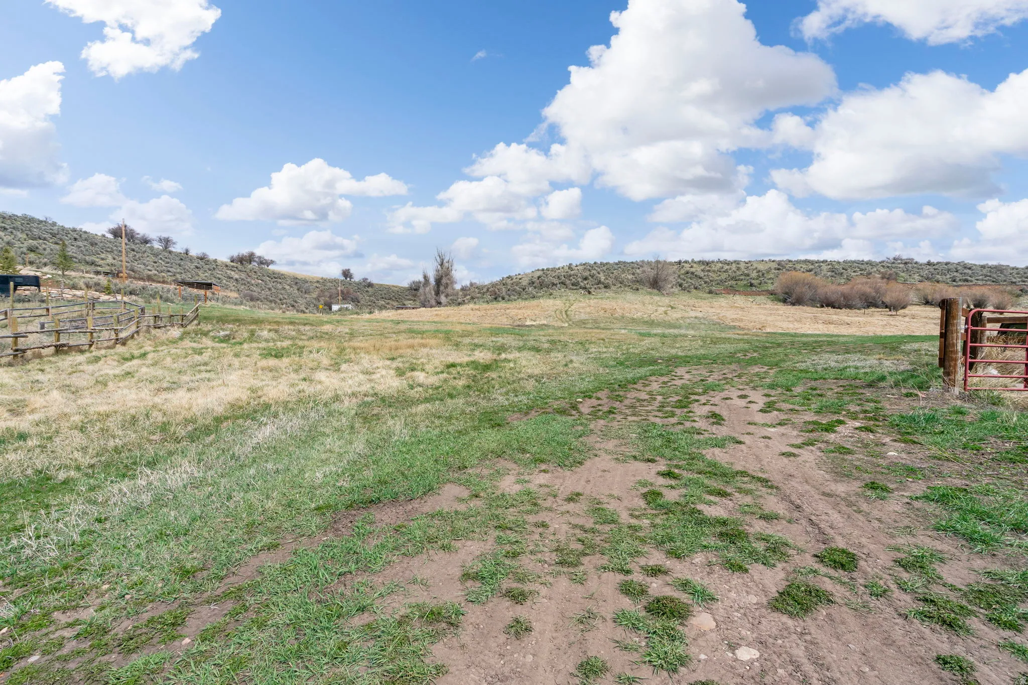 View of yard with a rural view