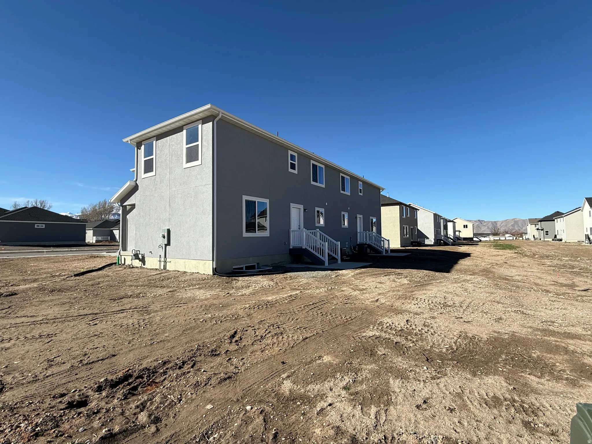 Rear view of property featuring a residential view