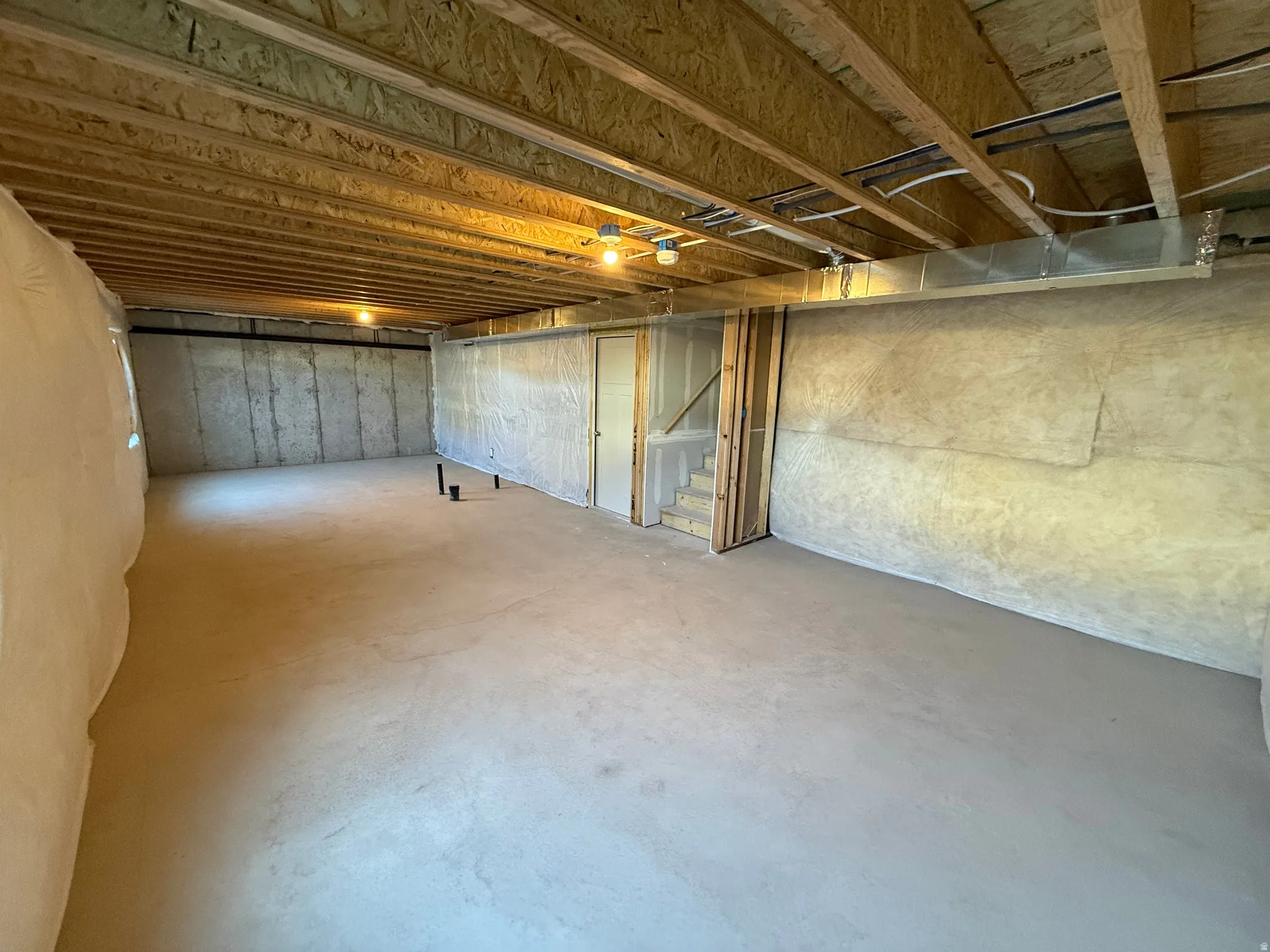 Unfinished below grade area with stairway