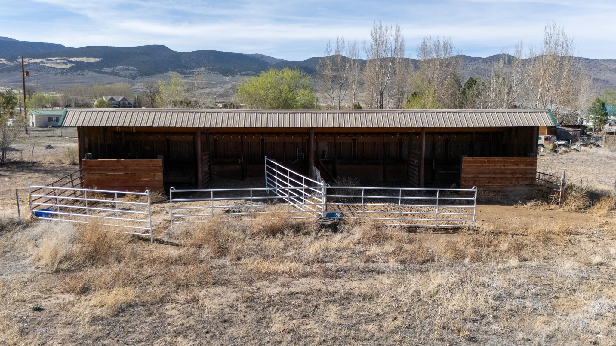 Stable featuring a mountain view and a view of countryside