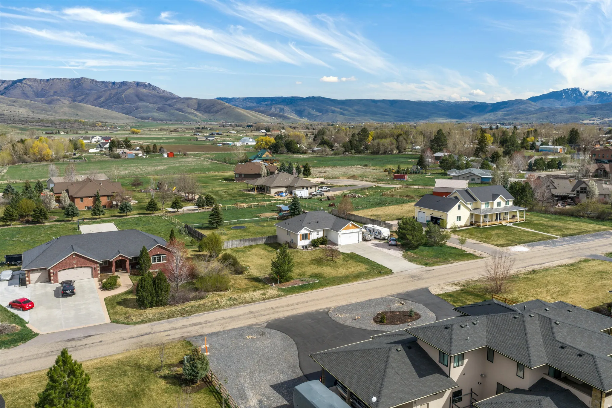 Aerial perspective of suburban area featuring mountains