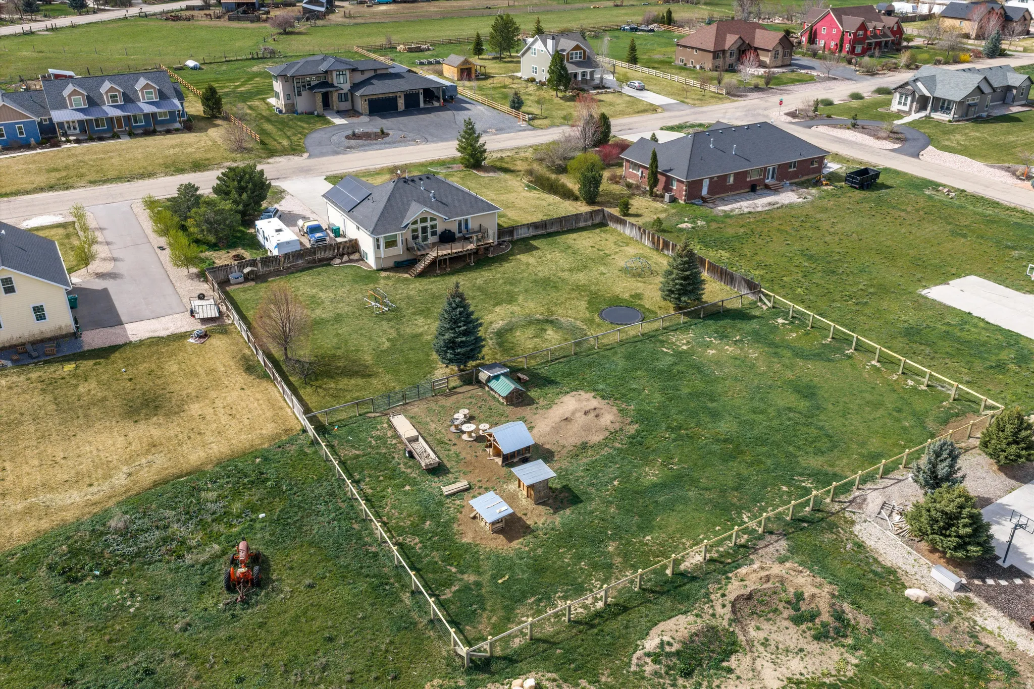 Aerial view of property's location featuring nearby suburban area
