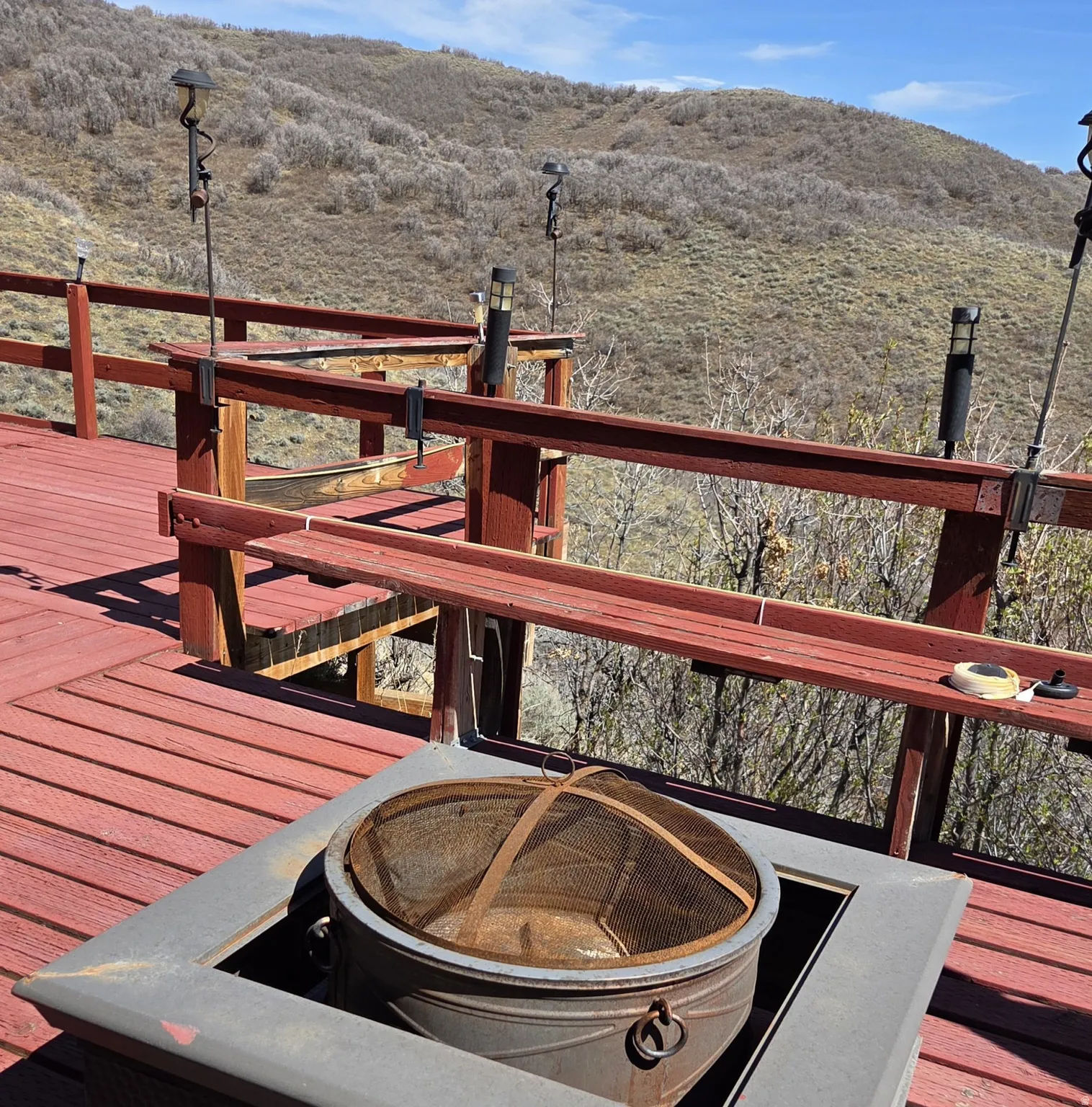 Wooden deck featuring a mountain view