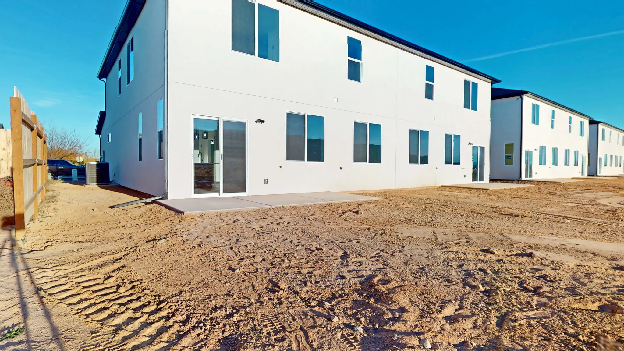 Back of property with a patio area