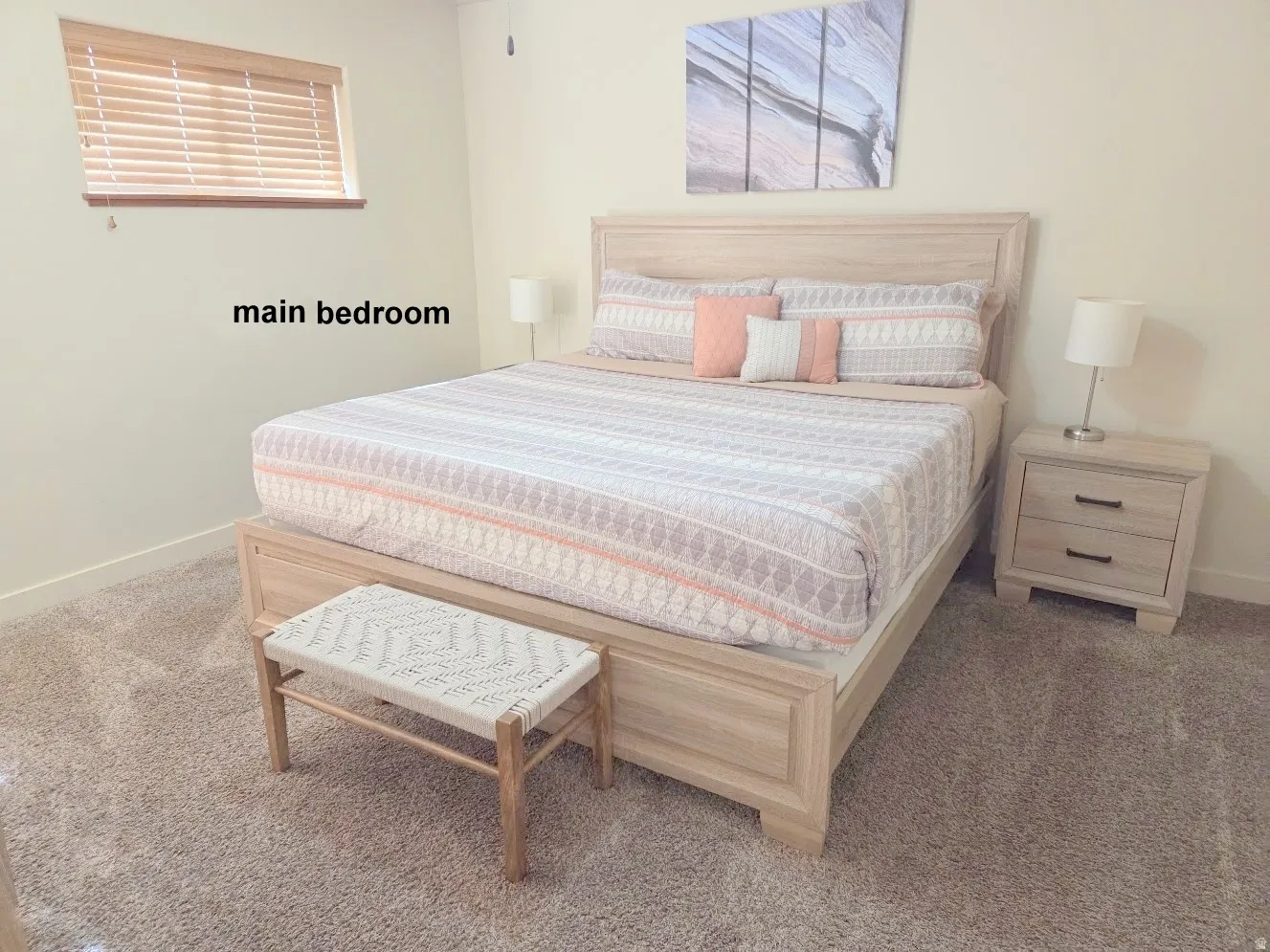 Plush carpeting provides comfort in this bedroom