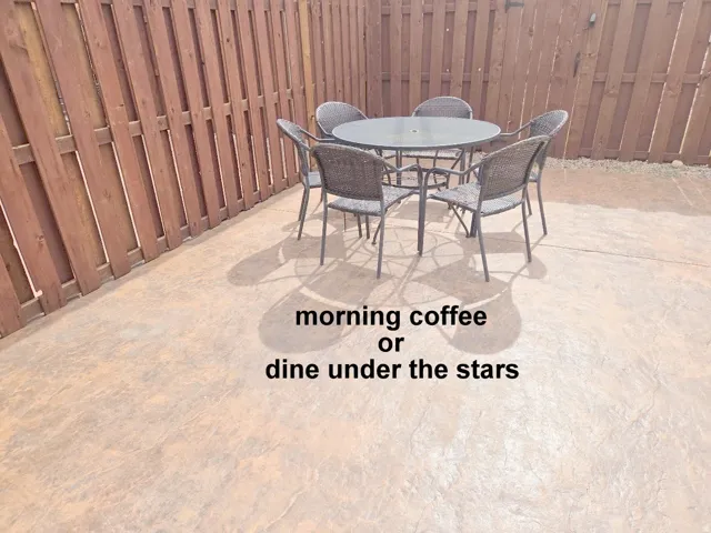 View of patio with outdoor dining area
