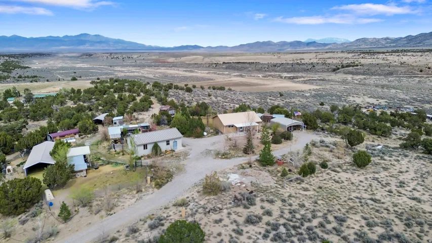 View of rural area featuring a desert landscape and mountains