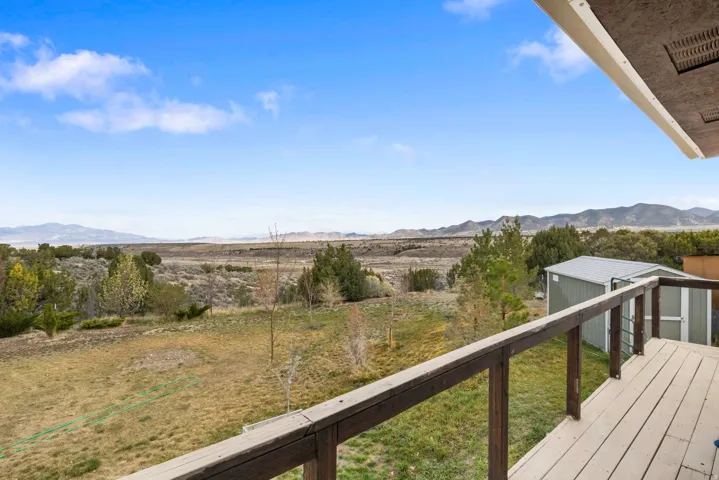 Balcony with a mountain view and a view of rural / pastoral area