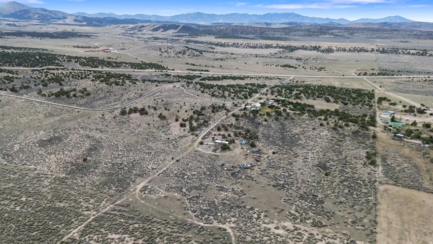 Overview of rural landscape with a mountain backdrop