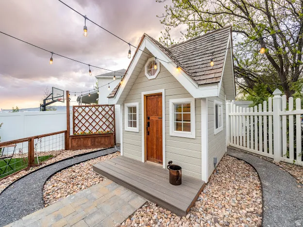 View of shed featuring a fenced backyard