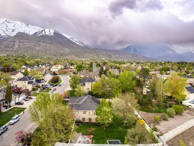 Aerial view of residential area with mountains