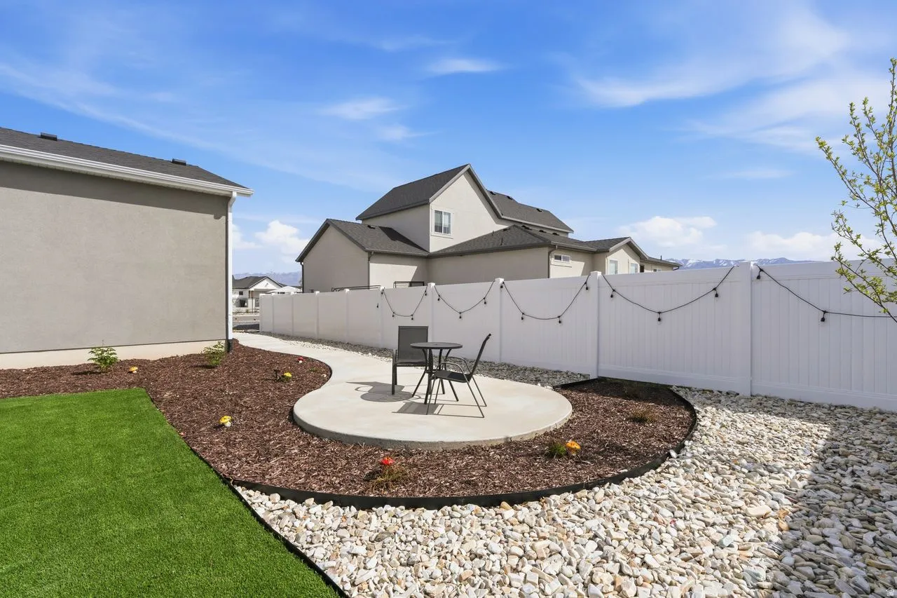 Fenced backyard featuring a patio area