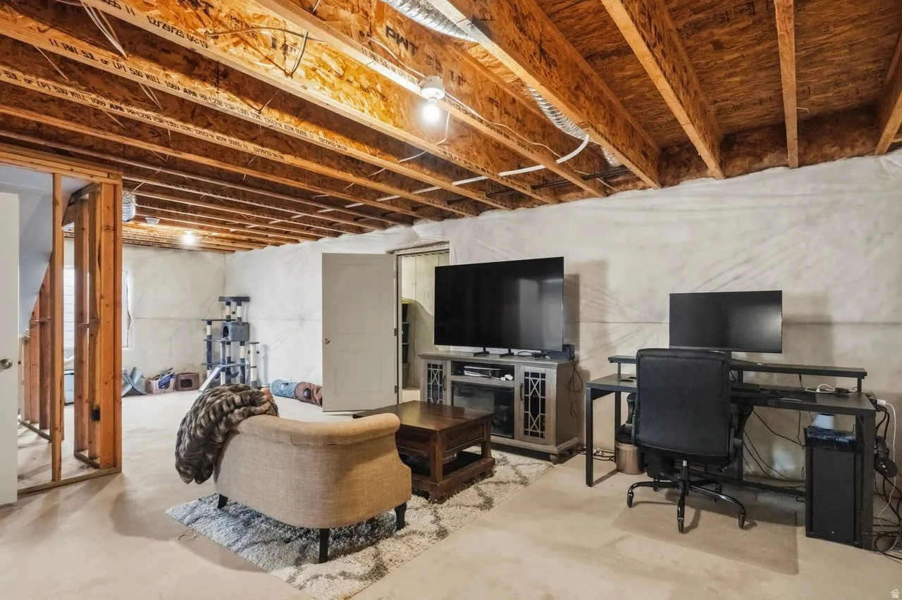 Home office featuring concrete floors
