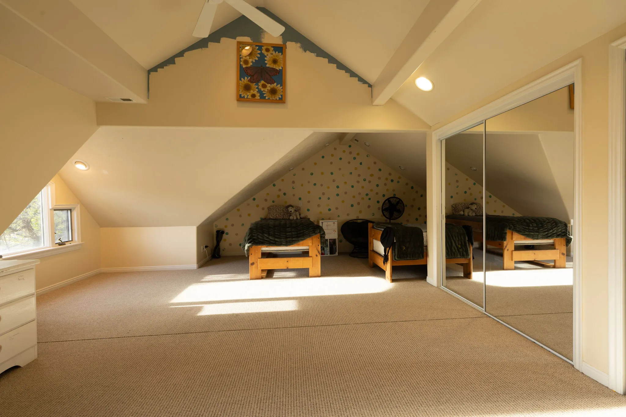 Additional living space featuring carpet floors, beamed ceiling, and recessed lighting