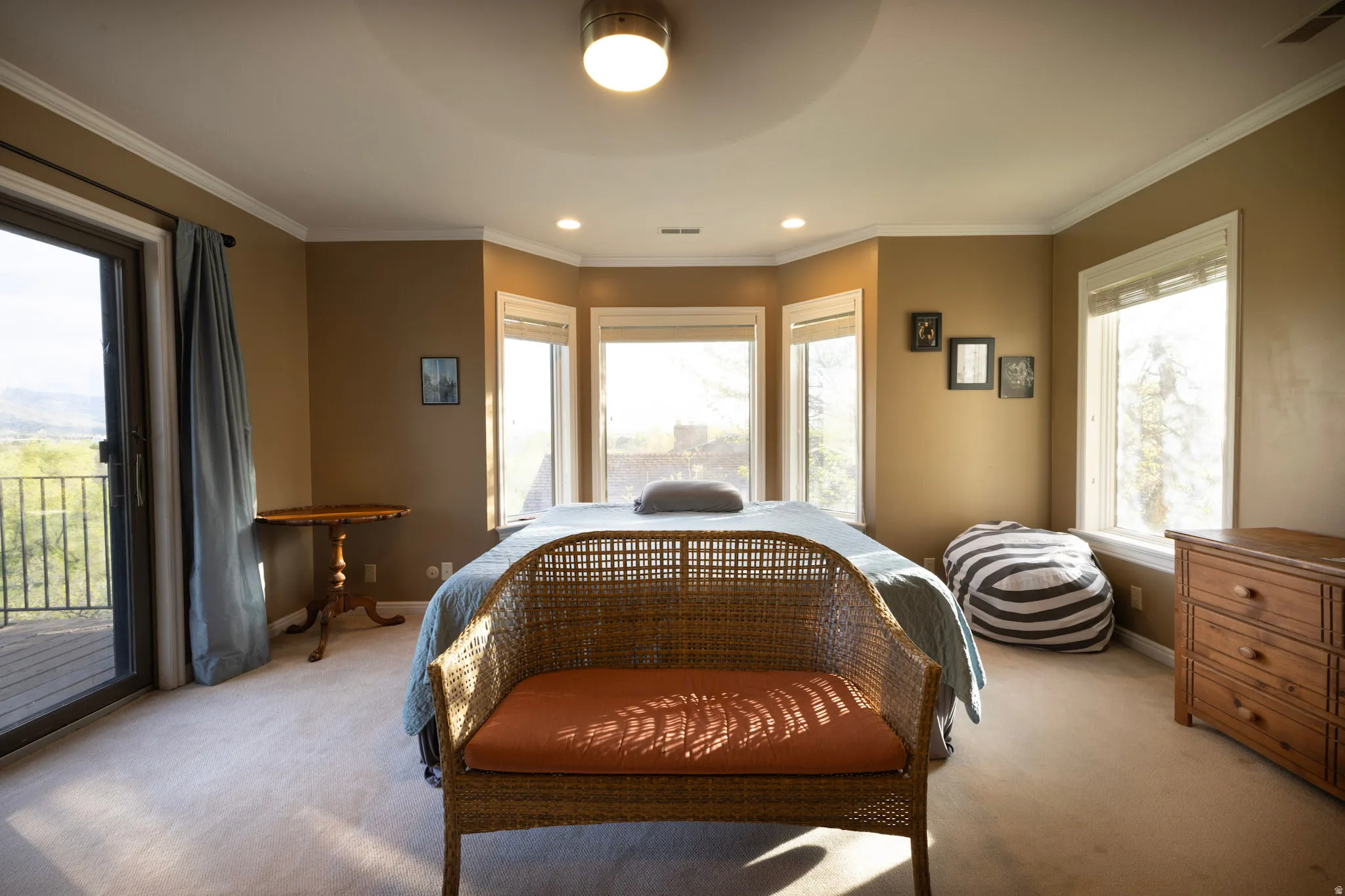 Bedroom with access to outside, crown molding, light carpet, recessed lighting, and a ceiling fan