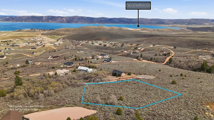 View of property location featuring property boundaries highlighted and a water and mountain view