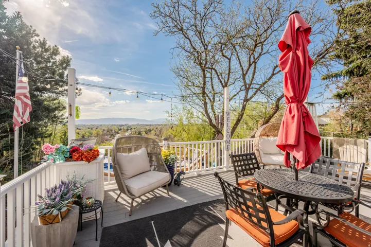 Wooden deck with outdoor dining space