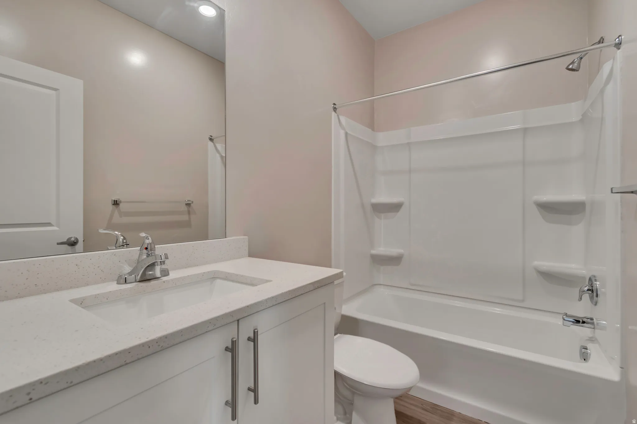 Main floor full bathroom with vanity.