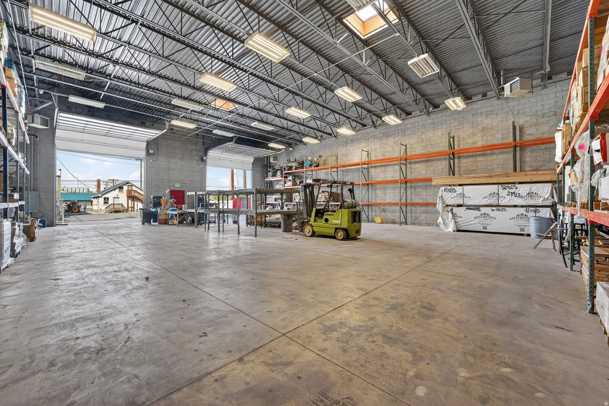 Garage featuring a heating unit