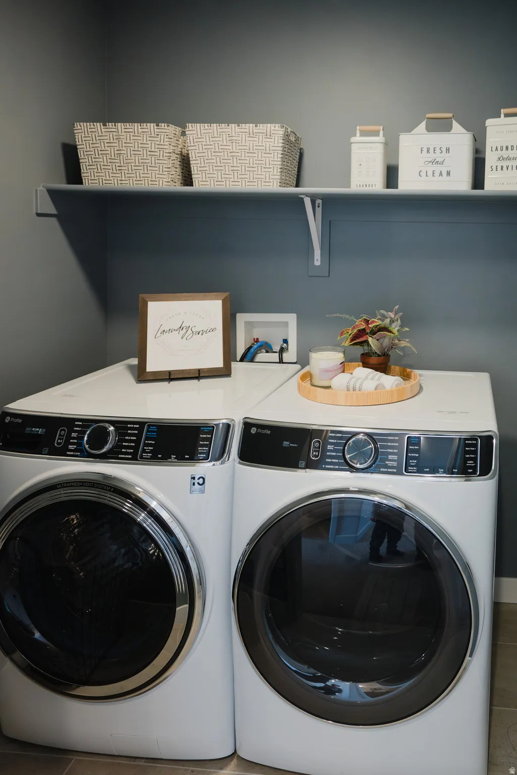 Laundry room with washing machine and dryer