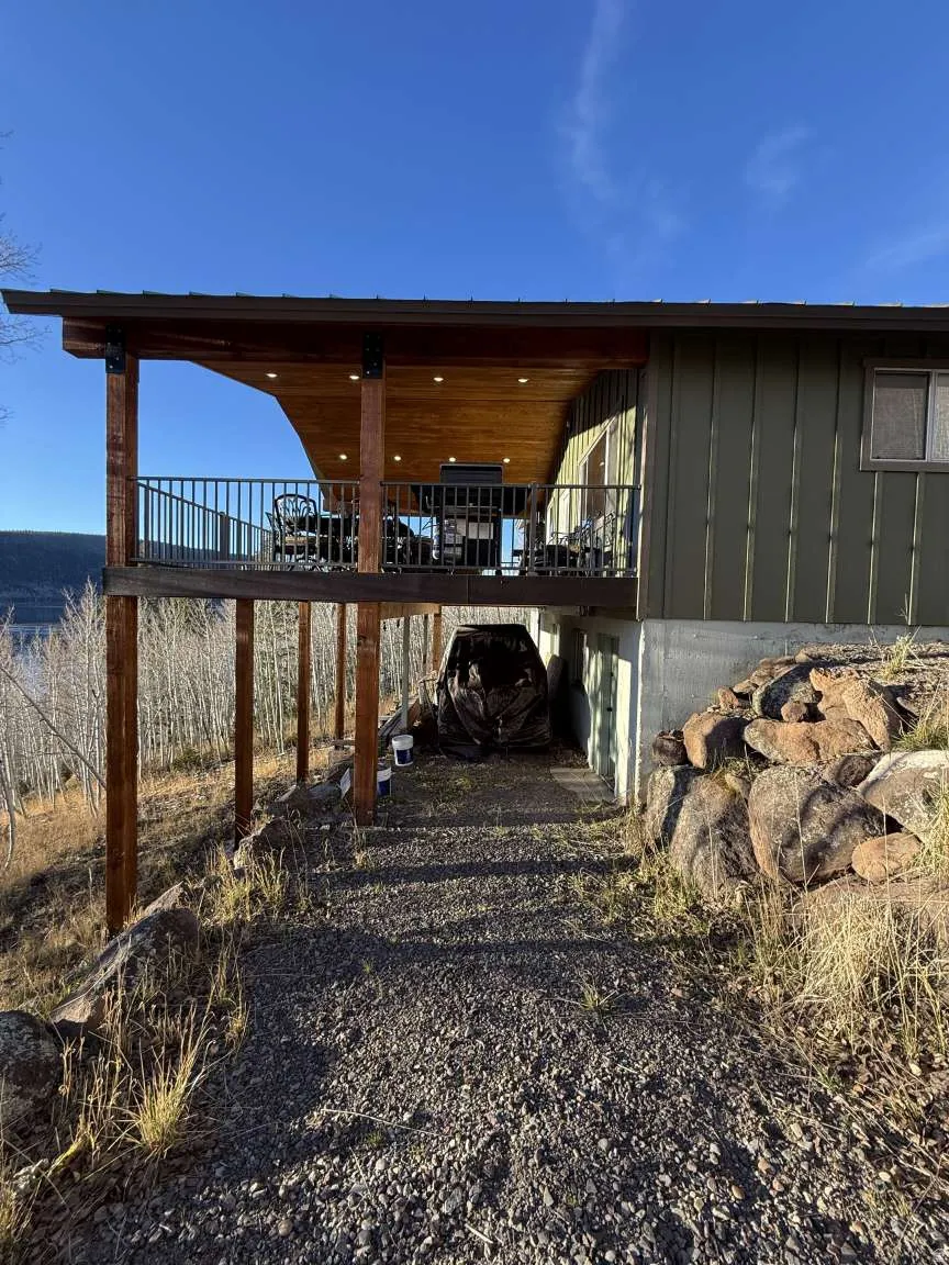 View of property exterior with board and batten siding
